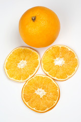 Cut citrus fruit of orange on white background