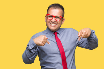 Middle age arab man wearing fashion red glasses over isolated background looking confident with smile on face, pointing oneself with fingers proud and happy.