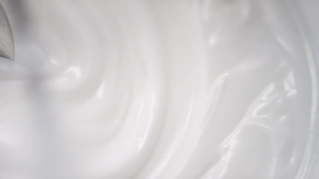 Close up of creamy supstance getting mixed