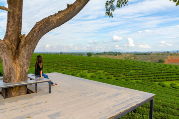 Lady sit on seat and feel relax on vacation 