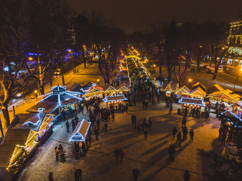 aerial view of old city square with christmas festival.