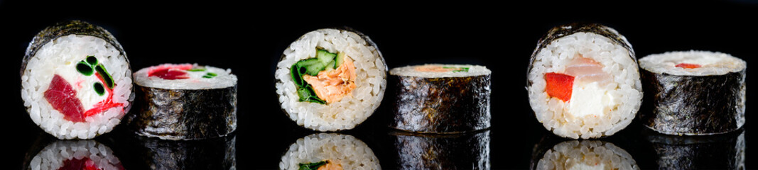sushi rolls on a dark background classic © smspsy