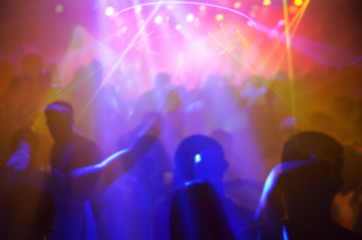 Fototapeta na wymiar Silhouette Blurry night club DJ party people enjoy of music dancing sound.Abstract Background.Nightlife and disco concept.