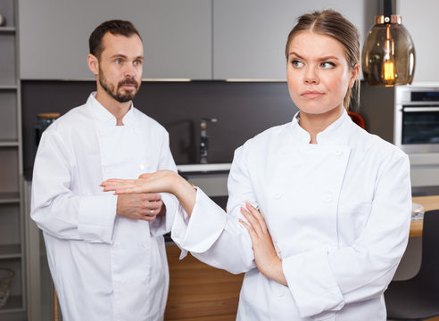 Two cooks having disagreements