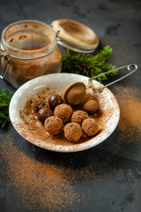 candy dressing  cocoa (dried fruit filling) sweets on a dark background. Top view. copy space