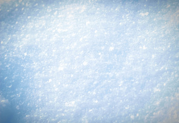 Fresh snow in winter snow texture close-up.