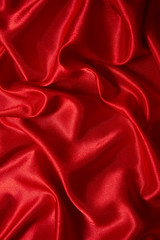 Luxury red satin smooth fabric background for celebration, ceremony, event invitation card or advertising poster