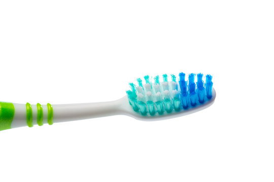 colored toothbrush on an isolated background, close up