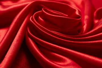 Luxury red satin smooth fabric background for celebration, ceremony, event invitation card or advertising poster