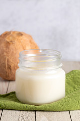Obraz na płótnie Canvas Canning Jar of Solidified Coconut Oil A Healthy Alternative to Vegetable Oils