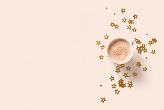 Coffee and stars on beige © mizina