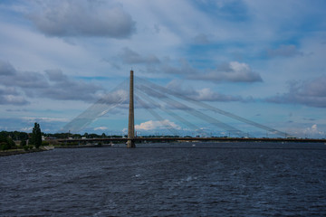 Fototapeta na wymiar Daugava River and Vansu Bridge (Vansu tilts). Riga, Latvia