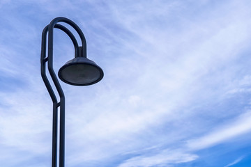 Street lamp or light pole with blue sky background