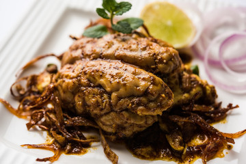 Brain / Bheja Fry of goat, sheep or lamb is a popular Indian or pakistani dish cooked on Bakra Eid(Eid-ul-zuha). served in karahi, pan or plate. selective focus
