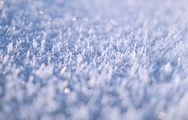 Frost and icicles in white focused at center