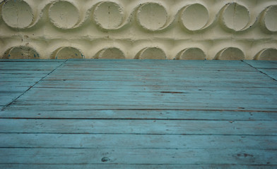 embossed wall surface and vintage turquoise floor