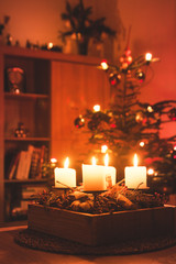 Traditional Advent candles wreath and christmas tree
