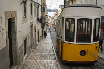 Naklejka na ściany i meble Old tram in Alfama district of Lisboa