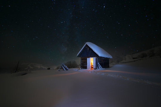 Fototapeta wooden house in winter forest snowy, landscape