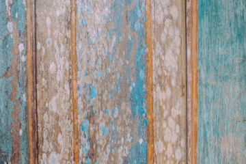 Shabby old wooden blue and yellow background.
