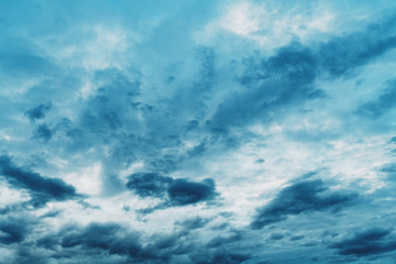 Naklejka na ściany i meble Dramatic winter sky with clouds