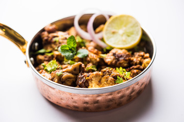 Brain / Bheja Fry of goat, sheep or lamb is a popular Indian or pakistani dish cooked on Bakra Eid(Eid-ul-zuha). served in karahi, pan or plate. selective focus