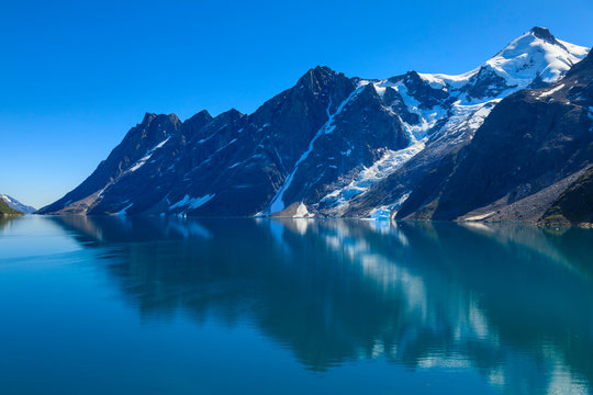Reflections, South Skjoldungen Fjord, Skjoldungen Island, glorious weather, King Frederick VI Coast, remote South East Greenland, Denmark
