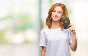 Young beautiful woman holding passport of australia over isolated background with a happy face standing and smiling with a confident smile showing teeth