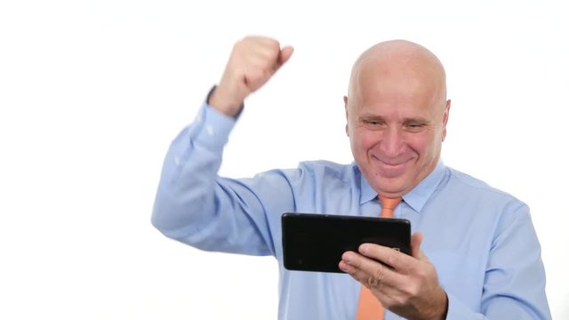 Businessman Image Reading Good News on Tablet Making Enthusiastic Hand Gesture