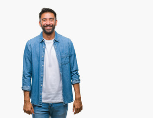 Fototapeta premium Adult hispanic man over isolated background with a happy and cool smile on face. Lucky person.