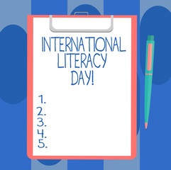 Handwriting text writing International Literacy Day. Concept meaning Celebrated annual event on 8 of September Blank Sheet of Bond Paper on Clipboard with Click Ballpoint Pen Text Space