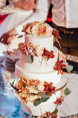 Beautiful delicious white wedding cake. Wedding day