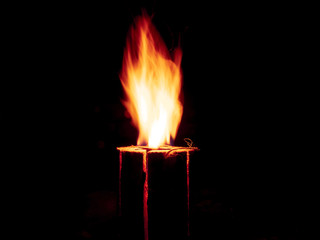 Schwedenfackel burning fire with black night background