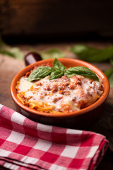 Lasagna dish on a rustic table
