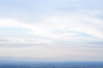 The sky is soft and colorful for the background, with space for text input. Natural view in northern Thailand.