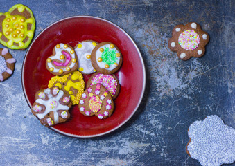 Gingerbread cookies on a board on an old tin counter