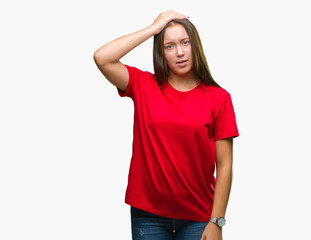 Fototapeta premium Young beautiful caucasian woman over isolated background confuse and wonder about question. Uncertain with doubt, thinking with hand on head. Pensive concept.