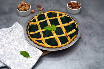homemade puff pastry with spinach filling with nuts