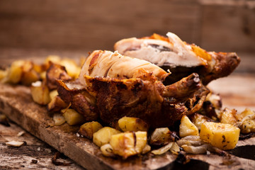  Whole roasted chicken on a cutting board