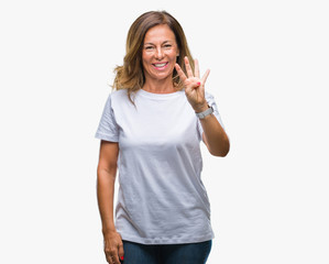 Middle age senior hispanic woman over isolated background showing and pointing up with fingers number four while smiling confident and happy.