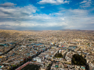 Aerial view of Arequipa city in Peru. Taken with the drone, a panoramic cityscape scene with buildings and houses and the Misti volcano.
