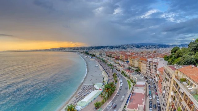 Sunset over Nice city and Mediterranean Sea aerial timelapse