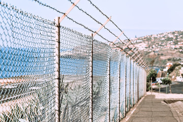 Strip of big stones on the sandy beach during an outflow