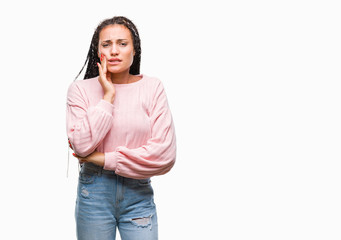 Young braided hair african american girl wearing sweater over isolated background touching mouth with hand with painful expression because of toothache or dental illness on teeth. Dentist concept.