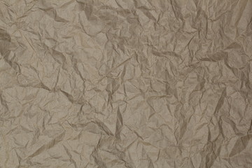 Light brown embossed background of paper.