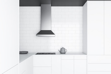 White brick kitchen, white countertops