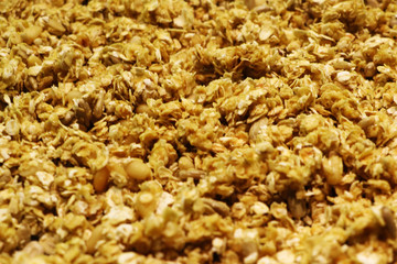 Organic homemade Granola Cereal with oats and almond. Texture oatmeal granola or muesli as background. Top view or flat-lay. Copy space for text.