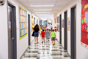 Children walking down school hallway © Ashok Sinha