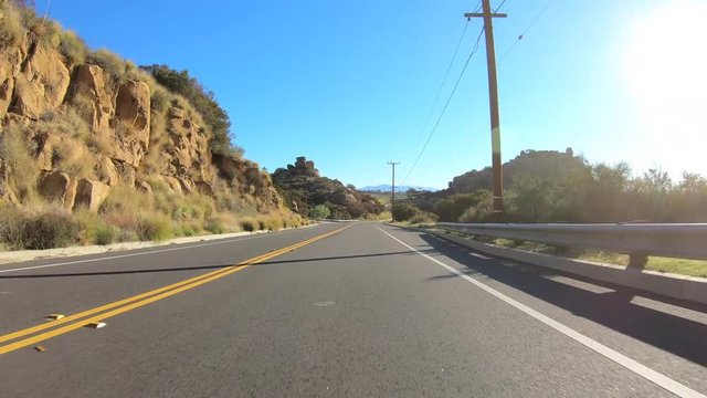 Los Angeles canyon road driving on Santa Susana Pass Road near Stoney Point and Topanga Canyon Bl in the San Fernando Valley.    