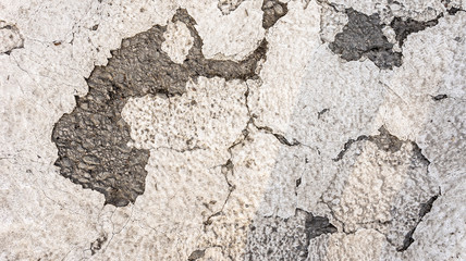 White and Grey Shabby wall painting background texture with asphalt cracks